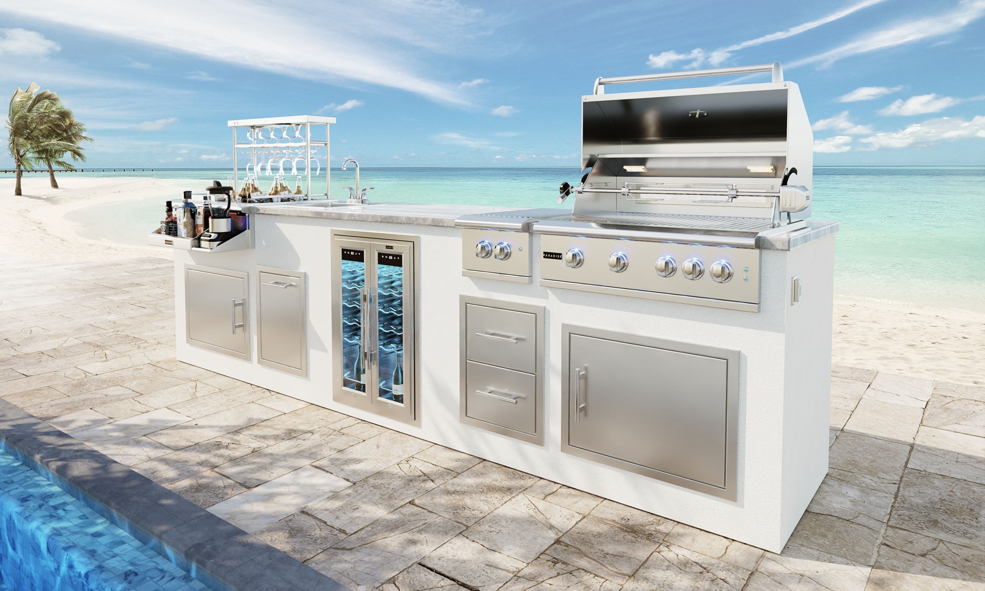 the image depicts the GX 12 Kitchen island with the GSL-32 Professional Grill, and CSL–32 Cocktail Station, accompanied by accessories including a wine fridge and double side burner.