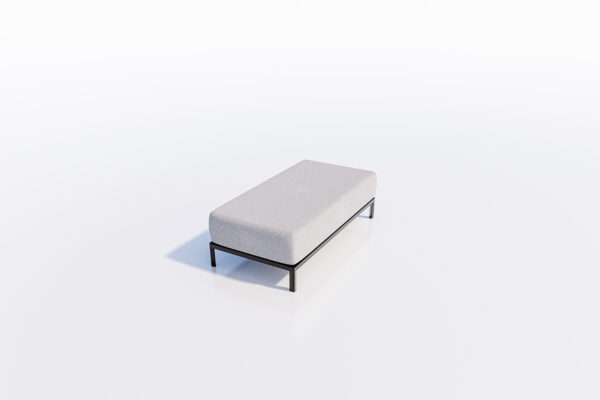 A simple and modern Ottoman with a light grey upholstery on a black metal frame, centered in a bright white space.